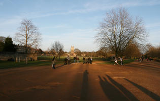 bright, dusk, England, eye level view, group, Oxford, park, path, people, The United Kingdom, tree, vegetation, winter