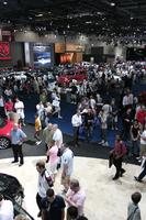 artificial lighting, crowd, elevated, England, exhibition, interior, London, people, The United Kingdom