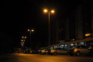 artificial lighting, building, car, car park, city, Croatia, eye level view, night, residential, spring, street, street light, urban, wet, Zadar, Zadarska