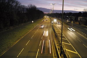 artificial lighting, car, car lights, city lights, elevated, England, evening, lamppost, London, night, outdoor lighting, road, The United Kingdom, traffic, urban, winter