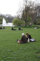 day, England, eye level view, girl, grass, group, London, park, people, sitting, spring, The United Kingdom, tree