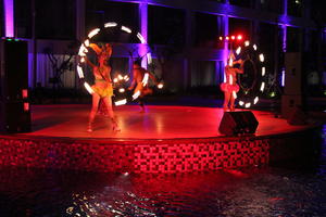 artificial lighting, Bali, couple, dancing, eye level view, Indonesia, night, people, performer, resort, summer, woman