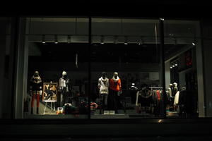 artificial lighting, city, England, eye level view, London, mannequin, night, outdoor lighting, retail, shop, shopfronts, The United Kingdom, urban