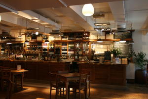 afternoon, artificial lighting, bar, bottle, Cambridge, chair, England, eye level view, furniture, interior, object, pub, spring, table, The United Kingdom