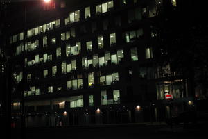 artificial lighting, city, city lights, England, eye level view, facade, interior, London, night, office building, outdoor lighting, The United Kingdom, urban