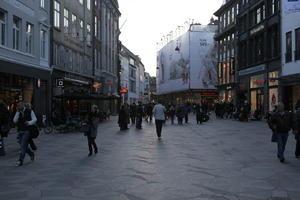 Copenhagen , crowd, Denmark, dusk, eye level view, Kobenhavn, pavement, people, retail, shop, spring