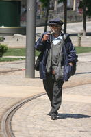 casual, day, direct sunlight, elderly, eye level view, male, man, Porto, Porto, Portugal, spring, street, sunny, walking