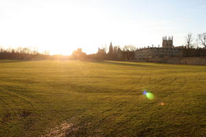 bright, England, eye level view, grass, Oxford, park, sun glare, sunlight, sunny, sunset, sunshine, The United Kingdom, winter