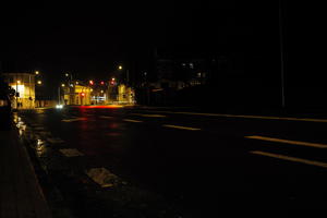 artificial lighting, city lights, eye level view, Kalisz, night, outdoor lighting, Poland, street, urban, wet, Wielkopolskie, winter