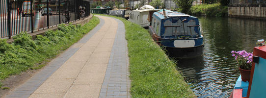 boat, canal, day, England, eye level view, grass, London, path, pavement, spring, sunny, The United Kingdom