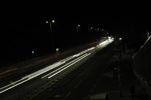 artificial lighting, car lights, city lights, elevated, England, evening, London, night, outdoor lighting, road, The United Kingdom, urban, winter