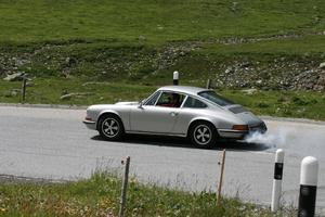 car, day, eye level view, mountain, natural light, road, Switzerland, Switzerland, vegetation