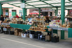 architecture, column, Croatia, day, eye level view, food, Istarska, market, natural light, object, people, spring, stall, sunny, vendor, woman