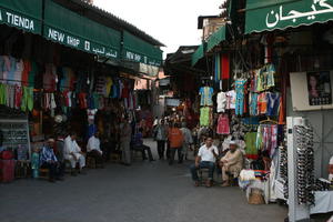 autumn, dusk, eye level view, group, market, Marrakech, Marrakesh, middleastern, Morocco, people, stall