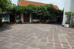 Bangkok, bush, day, eye level view, house, Krung Thep Mahanakhon, pavement, potted plant, shrub, summer, sunny, Thailand