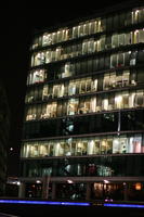 artificial lighting, below, England, eye level view, facade, London, night, office, office building, outdoor lighting, spring, The United Kingdom