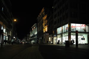 artificial lighting, England, eye level view, London, night, outdoor lighting, retail, shop, street, The United Kingdom