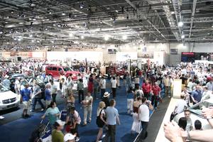 artificial lighting, ceiling, crowd, elevated, England, exhibition, interior, London, people, The United Kingdom