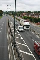 car, day, elevated, England, guardrail, London, natural light, road, The United Kingdom, truck, vegetation