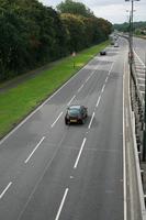 car, day, elevated, England, grass, guardrail, London, natural light, road, The United Kingdom, vegetation