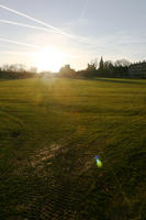 bright, England, eye level view, grass, Oxford, park, sun glare, sunlight, sunny, sunset, sunshine, The United Kingdom, winter