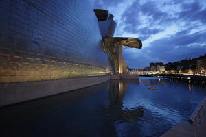 artificial lighting, Bilbao, canopy, evening, eye level view, facade, Guggenheim Museum, museum, Pais Vasco, pond, Spain