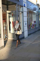 afternoon, day, England, eye level view, London, natural light, people, retail, street, The United Kingdom, walking, winter, winter, woman