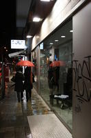 artificial lighting, Bari, couple, eye level view, Italia , night, people, Puglia, retail, shop, walking, winter, winter