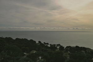 afternoon, Cirrostratus, cloudy, day, elevated, garden, haze, looking down, Monaco, Monte Carlo, Monte-Carlo, museum, overcast, seascape, sky, sun glare, top-down perspective, tree, tree canopy, treeline, winter