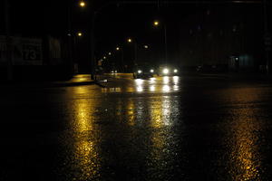 artificial lighting, city lights, eye level view, Kalisz, night, outdoor lighting, Poland, street, urban, wet, Wielkopolskie, winter