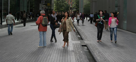 ambient light, casual, day, diffuse, diffused light, England, eye level view, London, natural light, passerby, people, plaza, square, street, summer, The United Kingdom, walking