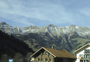 bright, chalet, cliffs, day, eye level view, mountain, nature, open space, outdoors, rocks, snow, sunlight, sunny, Switzerland, Valais, winter