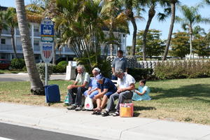 bus stop, day, eye level view, Florida, group, palm, pavement, people, Sarasota, sitting, sunny, sunshine, The United States, winter