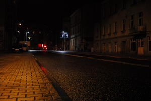 artificial lighting, city lights, eye level view, Kalisz, night, outdoor lighting, pavement, Poland, street, urban, wet, Wielkopolskie, winter