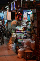 artificial lighting, autumn, clothing, Essaouira, eye level view, food, market, Morocco, stall