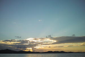 afternoon, autumn, backlight, cloud, cloudy, Cumulus, day, dusk, eye level view, godrays, natural light, open space, sky, sun