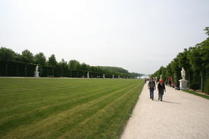 bush, couple, day, eye level view, France, grass, Ile-De-France, landmarks, Palace of Versailles, Paris, park, path, people, spring, summer, summer, sunny, tree, vegetation, walking