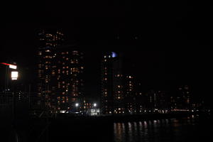 artificial lighting, city, city, city lights, cityscape, England, eye level view, housing block, London, night, river, The United Kingdom, tower, winter