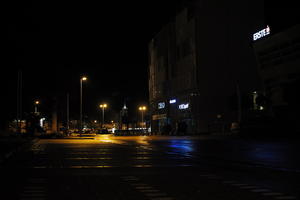 artificial lighting, building, city, Croatia, eye level view, night, pavement, spring, street, urban, wet, Zadar, Zadarska