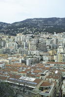 afternoon, building, cityscape, cliffs, cloudy, day, elevated, facade, looking down, Monaco, Monte Carlo, Monte-Carlo, overcast, roof, roofscape, sun glare, top-down perspective, winter