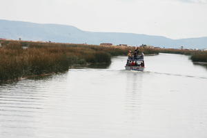 boat, day, eye level view, lake, natural light, Peru, Puno, reed, spring