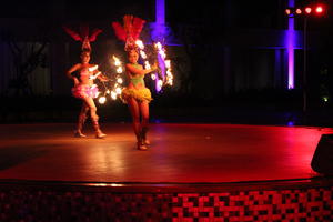 artificial lighting, Bali, couple, dancing, eye level view, Indonesia, night, people, performer, resort, summer, woman