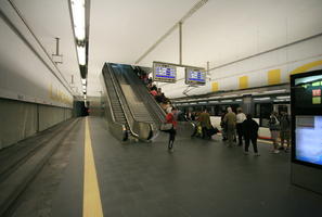 artificial lighting, Calpe, ceiling, crowd, display, escalator, eye level view, fluorescent, indoor lighting, interior, people, platform, Spain, standing, station, steps, underground, Valenciana