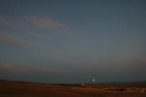 building, cloud, desert, evening, eye level view, house, landscape, moon, Morocco, natural light, open space, Ouarzazate, outdoors, sky