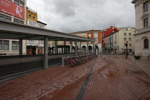 Burgos, Castilla y Leon, day, diffuse, diffused light, eye level view, natural light, overcast, pavement, Spain, street, wet