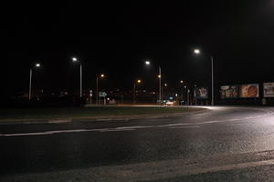 artificial lighting, city lights, eye level view, Kalisz, night, outdoor lighting, Poland, street, urban, wet, Wielkopolskie, winter