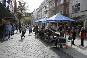 autumn, Bielefeld, bright, cafe, casual, chair, day, Deutschland, eye level view, furniture, group, Nordrhein-Westfalen, people, sitting, street, sunny, umbrella