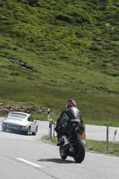 back, car, day, eye level view, motorcycling, mountain, natural light, road, Switzerland, Switzerland, vegetation