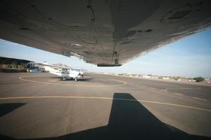 airplane, airport, day, eye level view, Ica, natural light, Nazca, Peru, sunny, wing