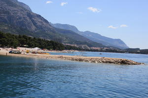 beach, coastline, Croatia, day, eye level view, Makarska, people, seascape, Splitsko-Dalmatinska, summer, sunbathing, tree, vegetation